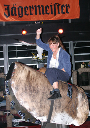 Riding the mechanical bull at Cowgirls Inc