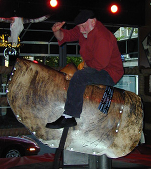 Riding the mechanical bull at Cowgirls Inc